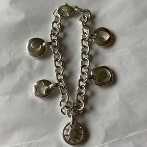 Authentic Tiffany & Co. 925 silver stencil cutouts charm bracelet.